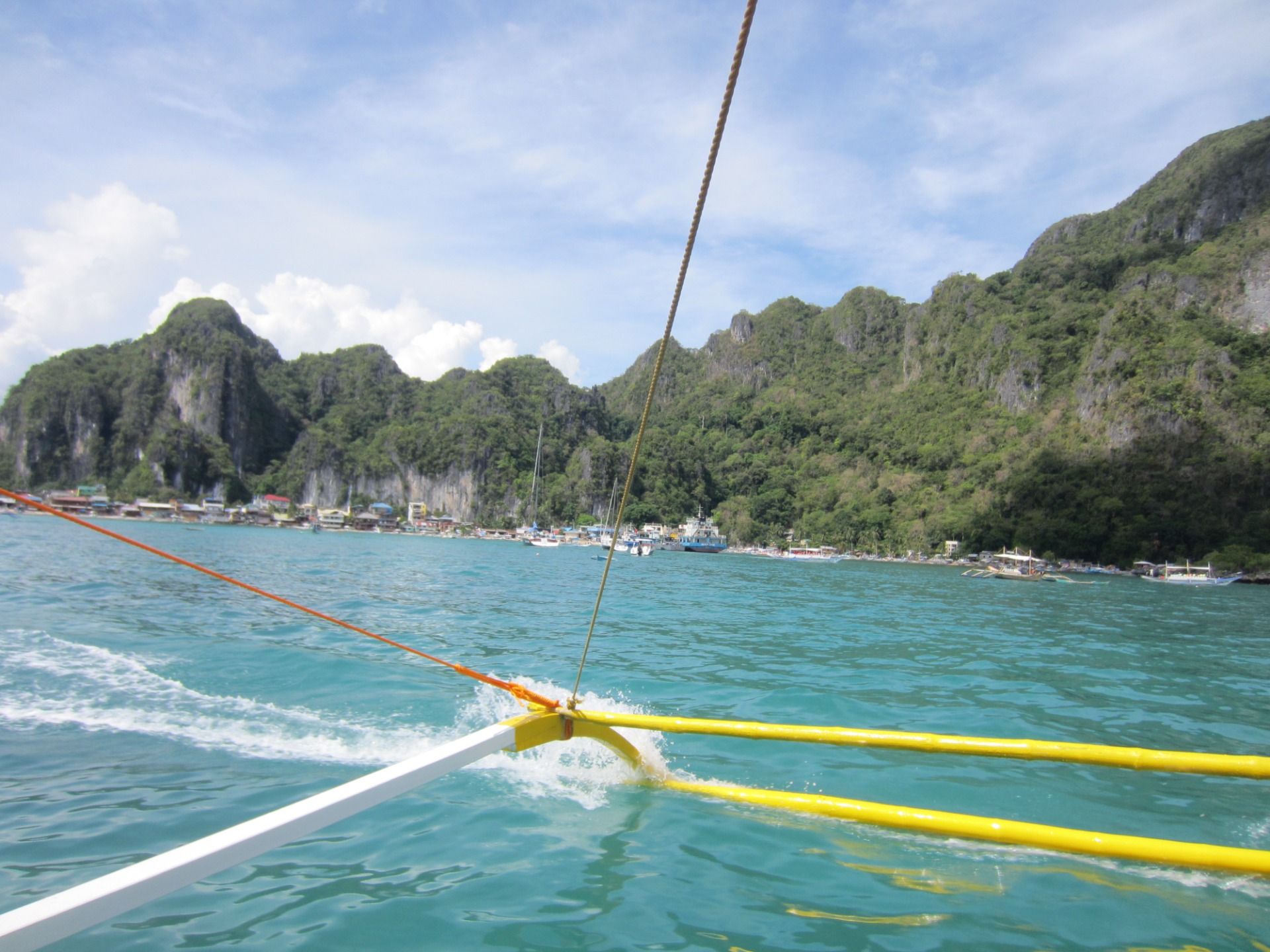 Tip in and it sprays the water as it trails behind.