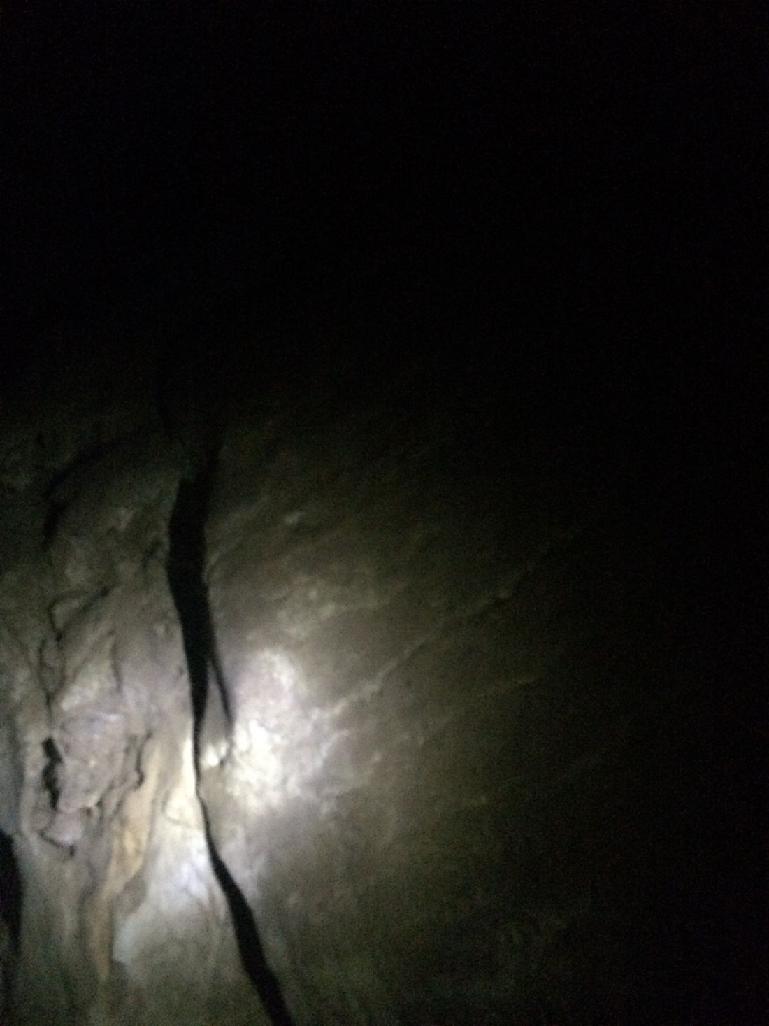 To dark to see. A photo flash lights the way.