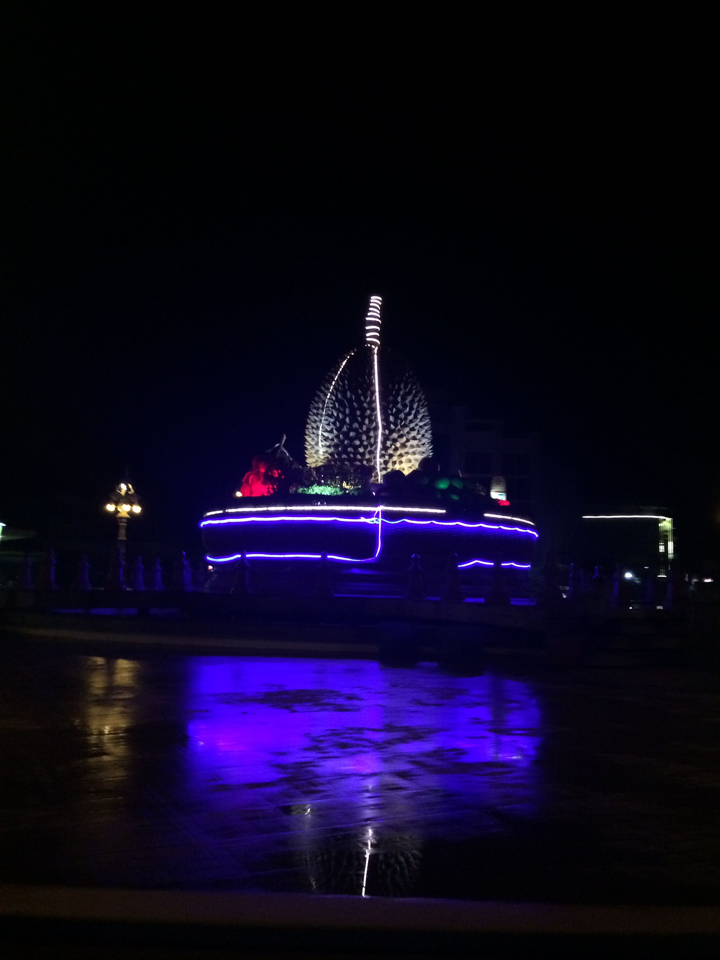 Ride around the Durian at night.