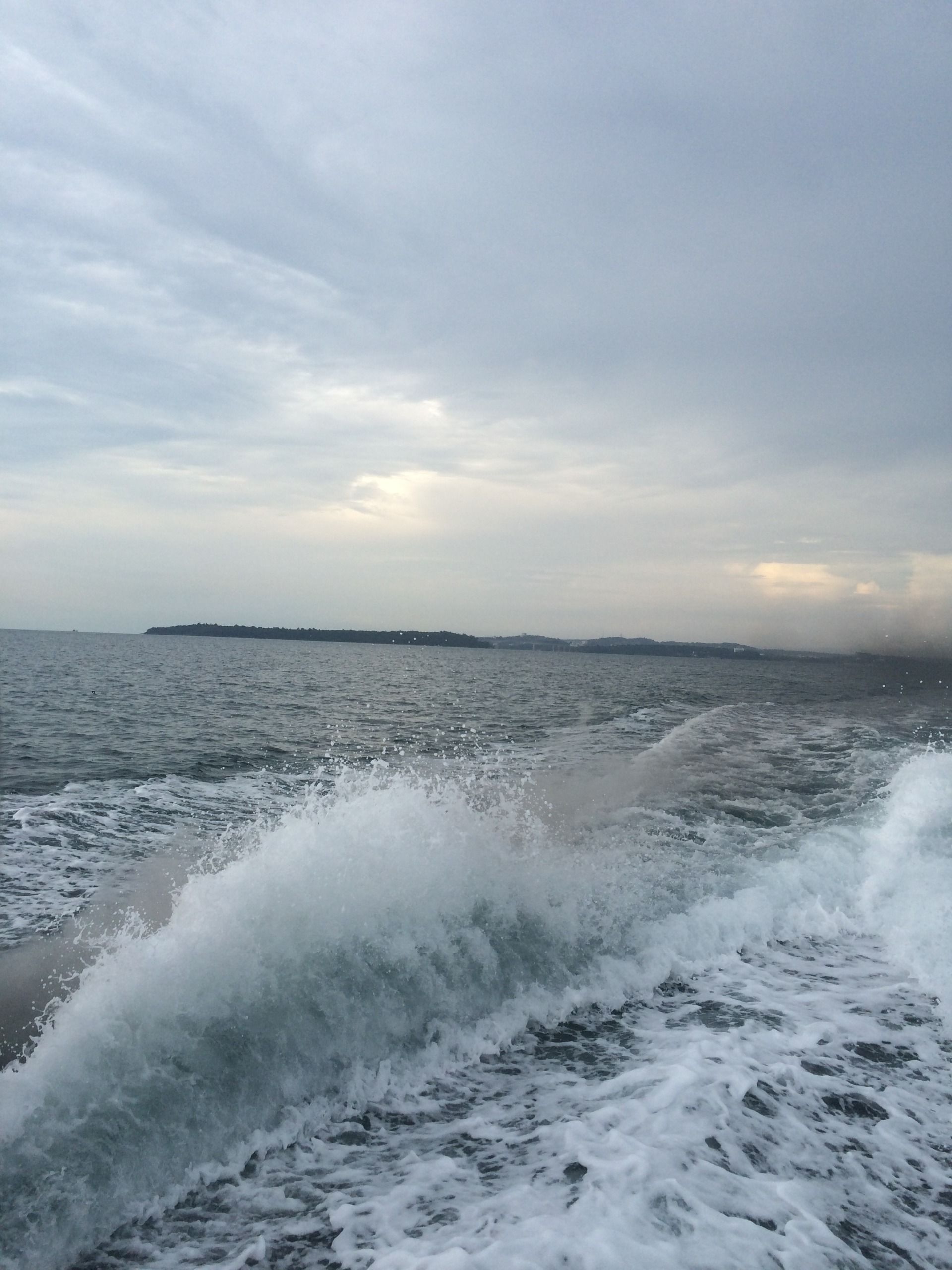 Mainland behind us now the open ocean to sea.