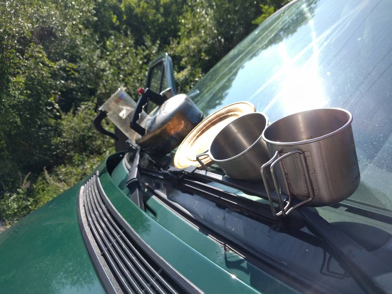 Camping life: dishes drying in the sun ☀️