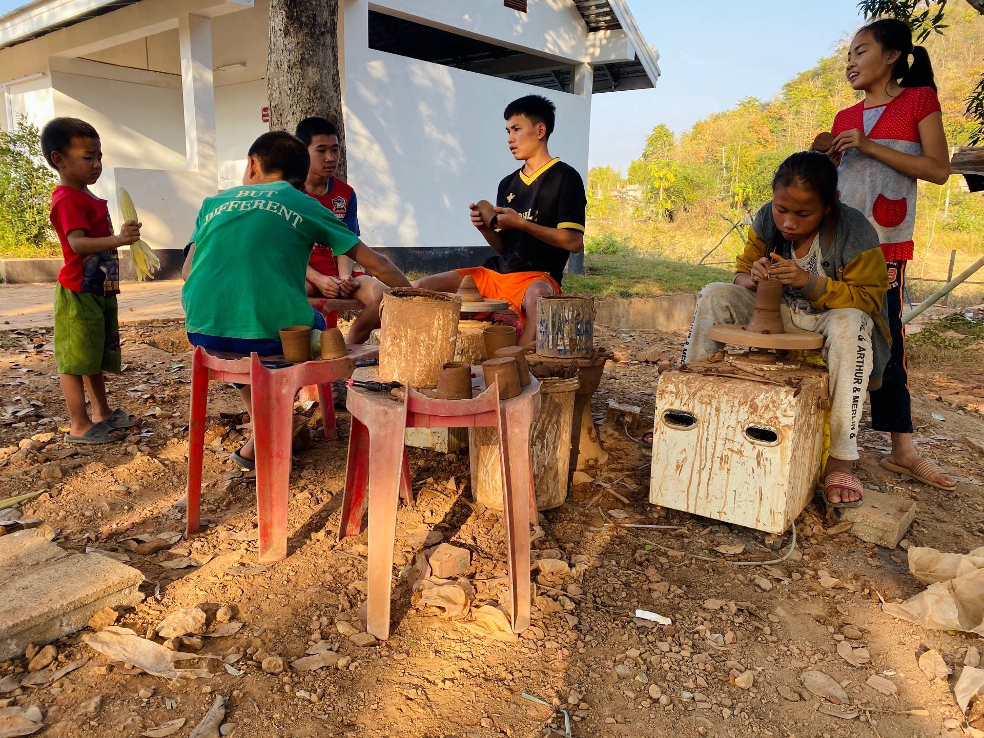 Local children and teenagers making pottery. Unfortunately, we couldn't ask them if they lived there, worked there or if they were just there for a pottery class. 