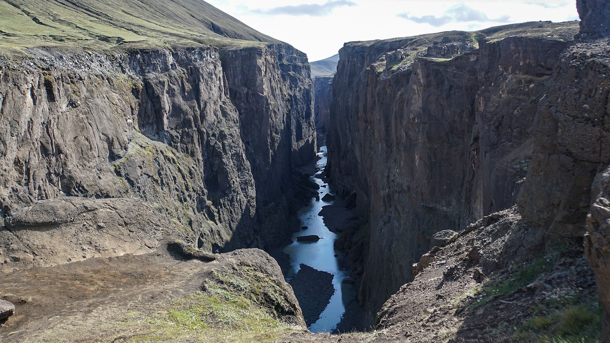 Off the beaten path: Hafrahvammagljúfur Canyon and the hot spring shower.