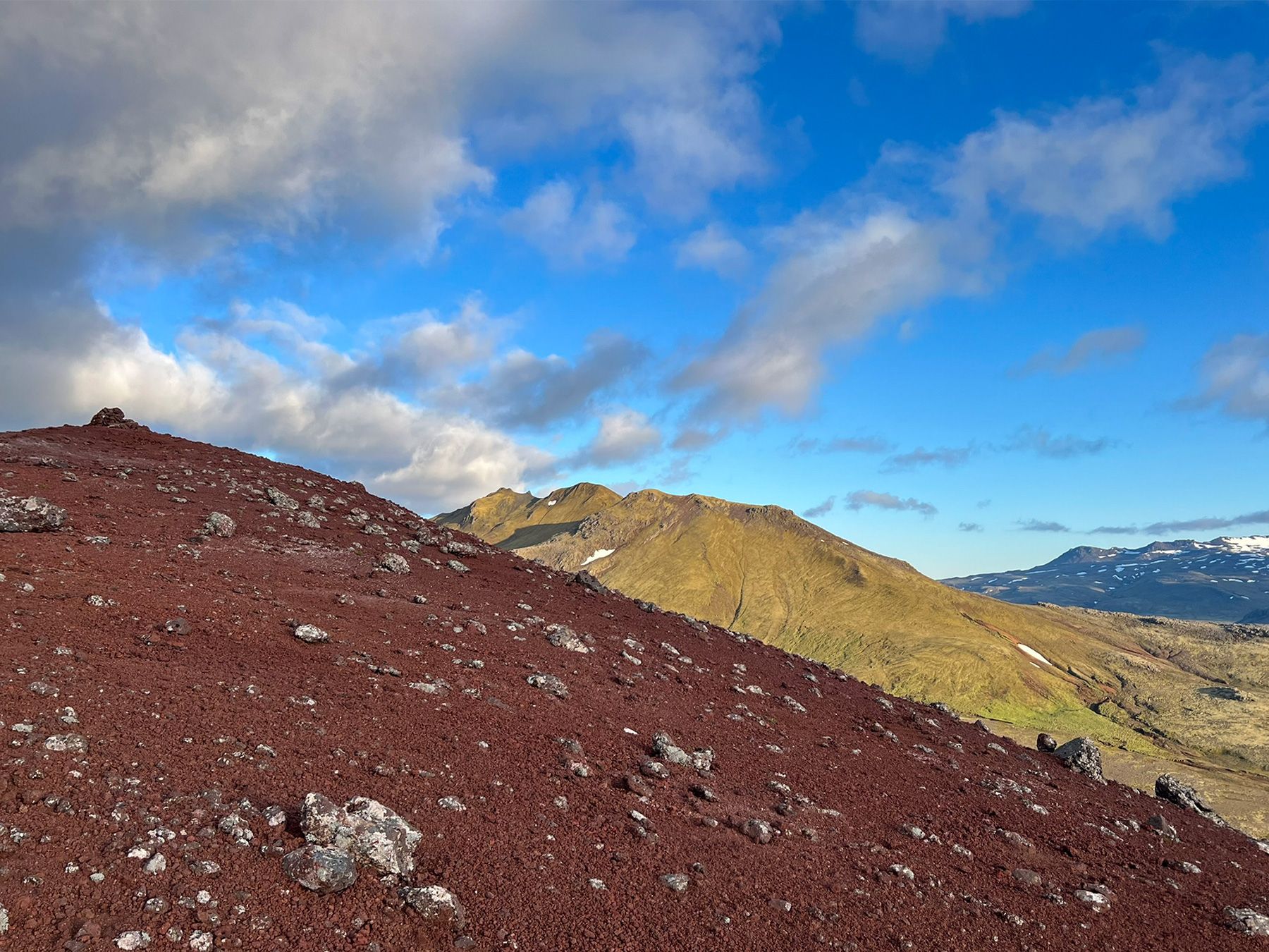 Here it appears from behind the red edge of the Rauðkúla crater.