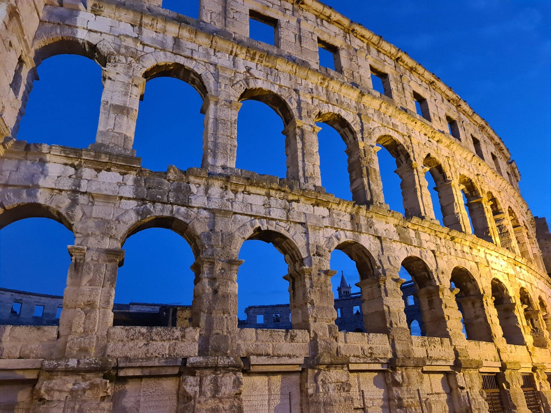 The Pula Arena at the blue hour