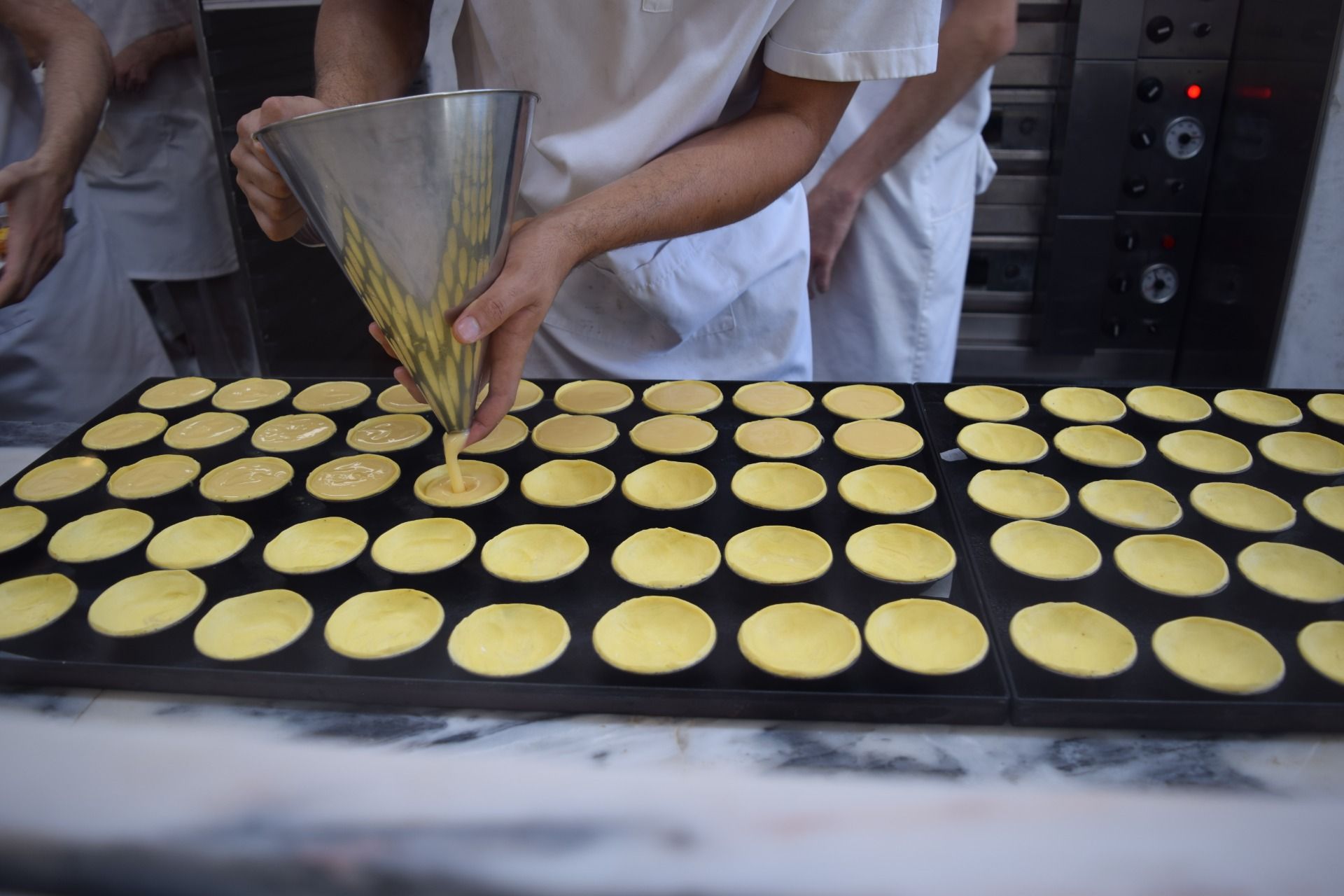 Pastel de Nata being prepared