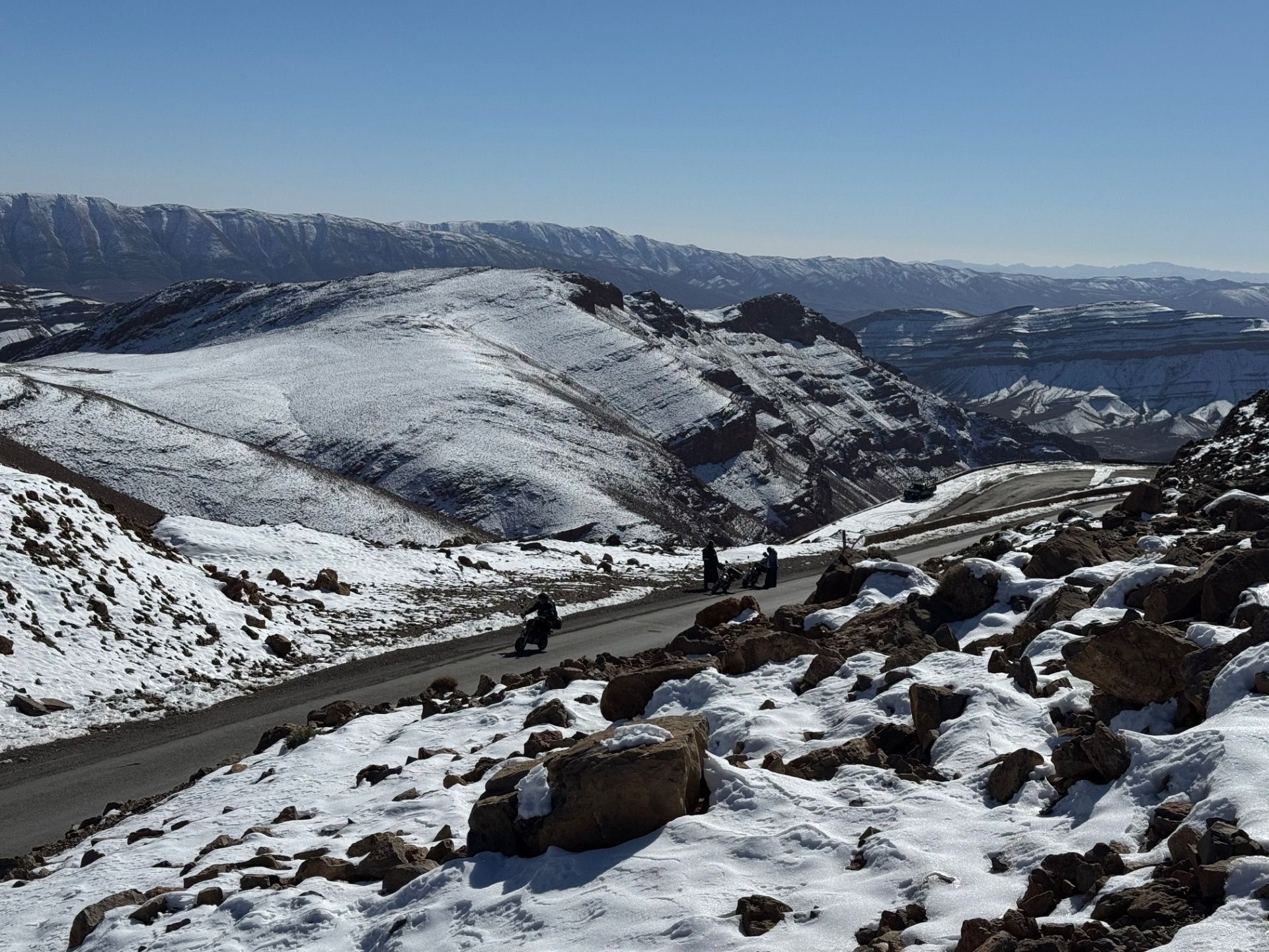 Fellow monkeys flying up the mountain road