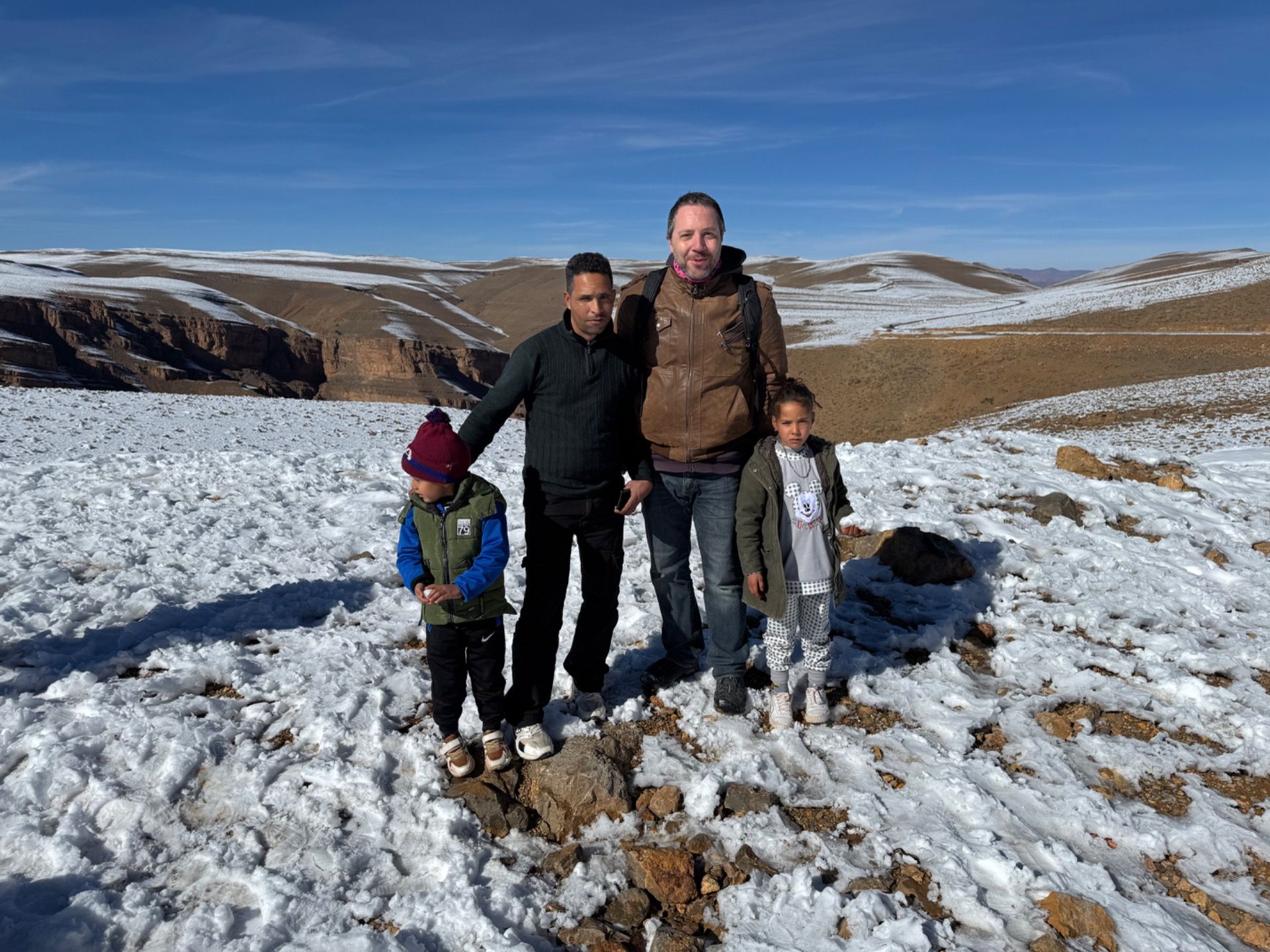 Met these people at the top. They asked me take their picture so I got a picture with them too. Note the snowballs.