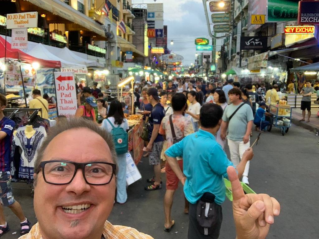 Busy streets with people from all around the world at a late afternoon at Khaosan road in Bangkok