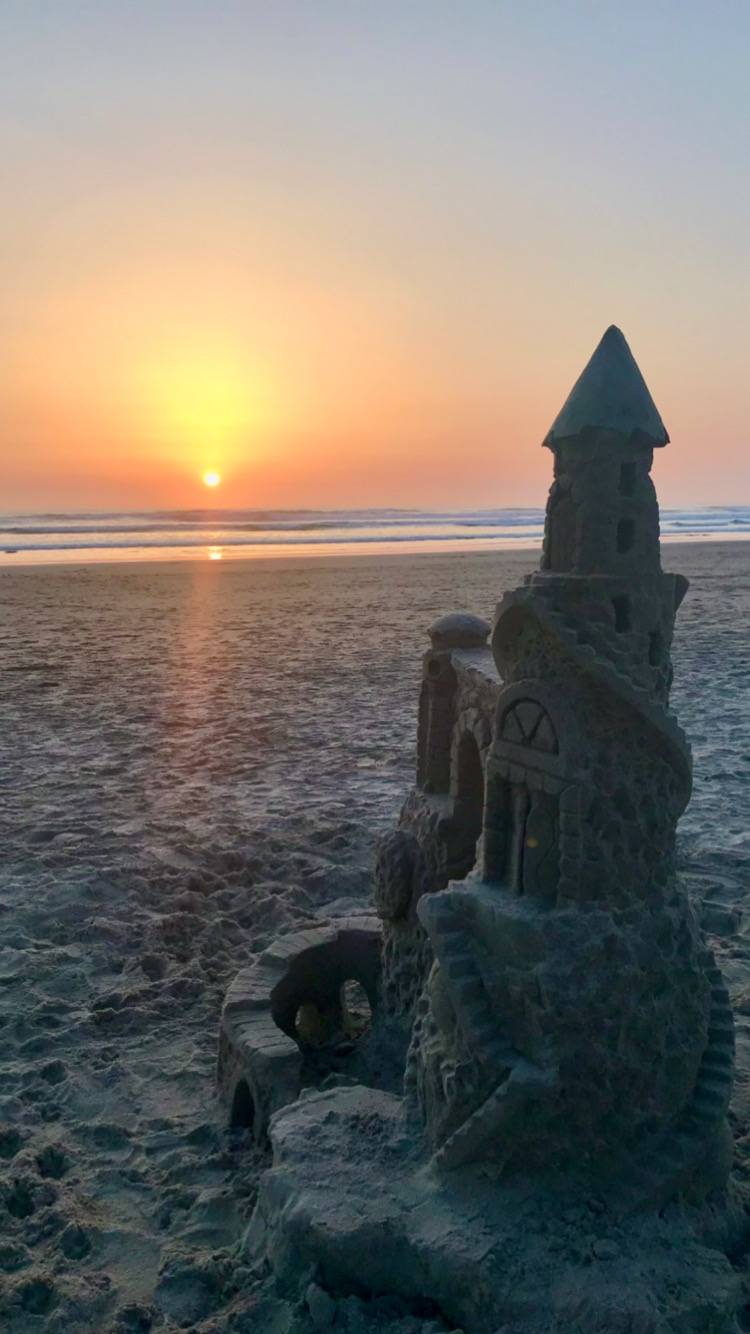 Sandcastle and sunset.