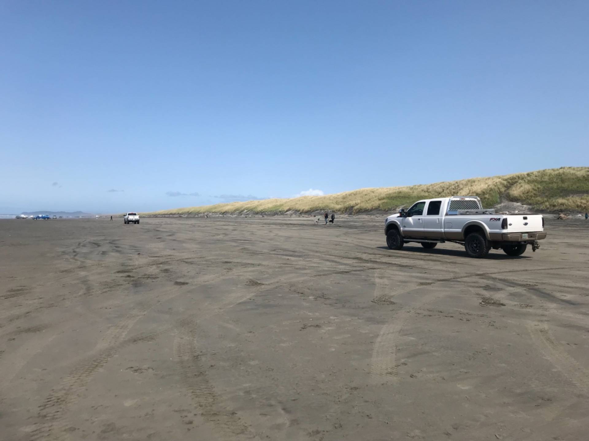 Trucks on the beach! Kind of cool, but I think I prefer my beaches vehicle free.