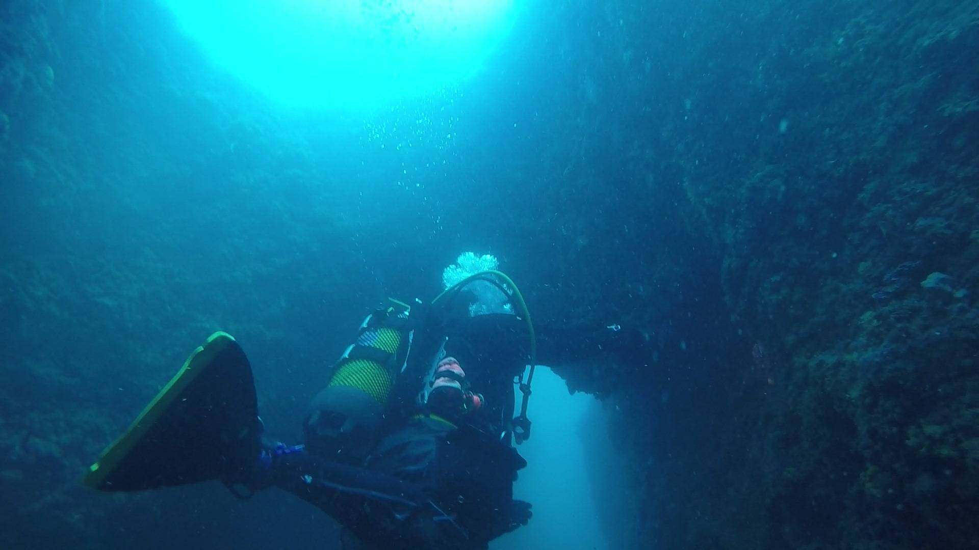 My diving partner guiding the dive through the underwater cave.