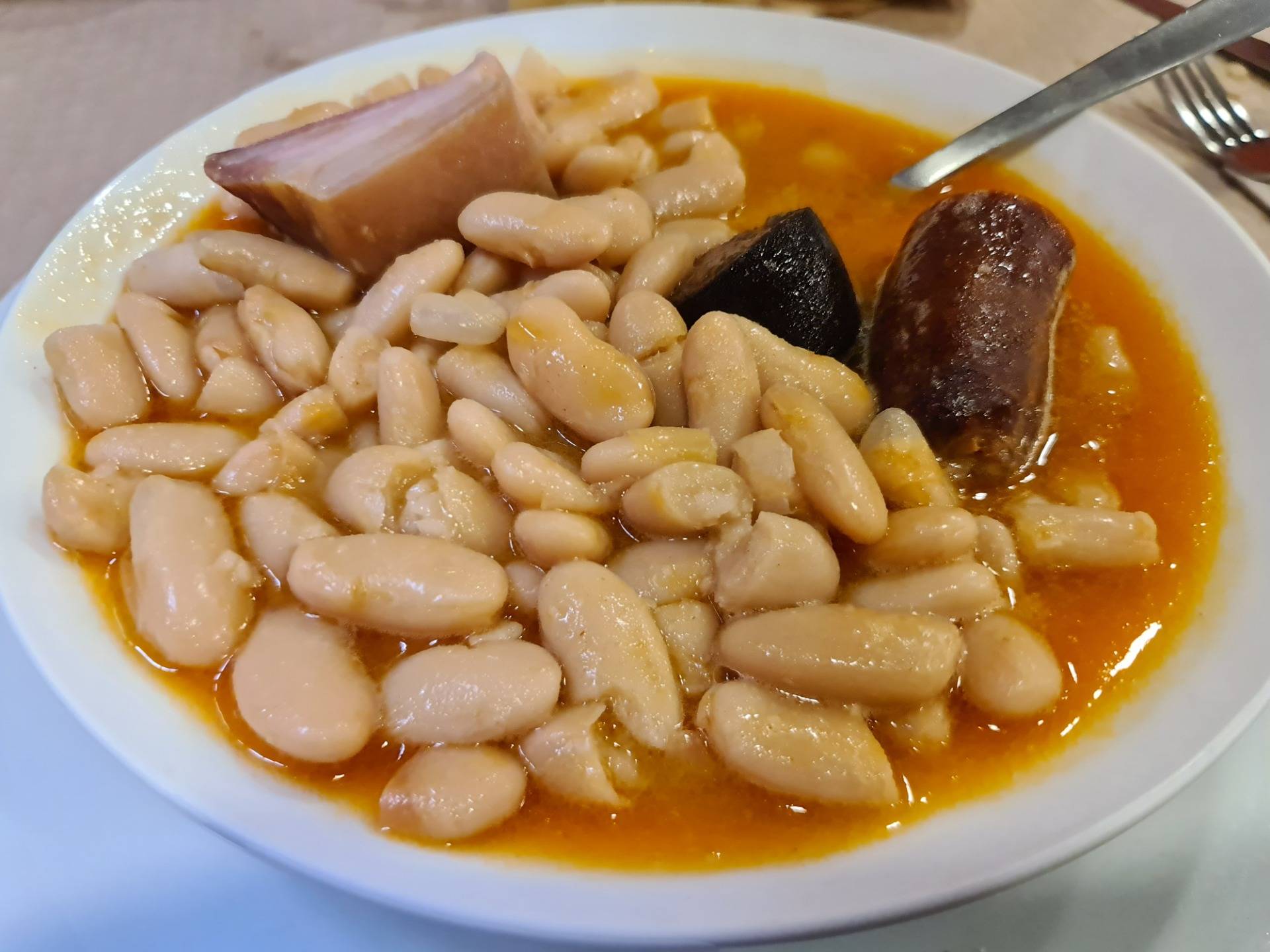 Asturian fabada: Bean stew with diverse pork meat (€14.50) (2).