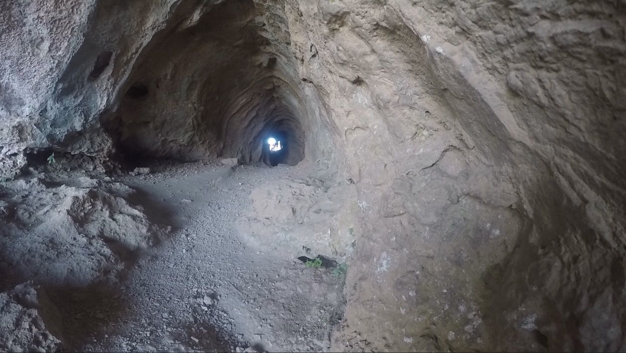 ”The Hole” entrance and exit (light at the the end).