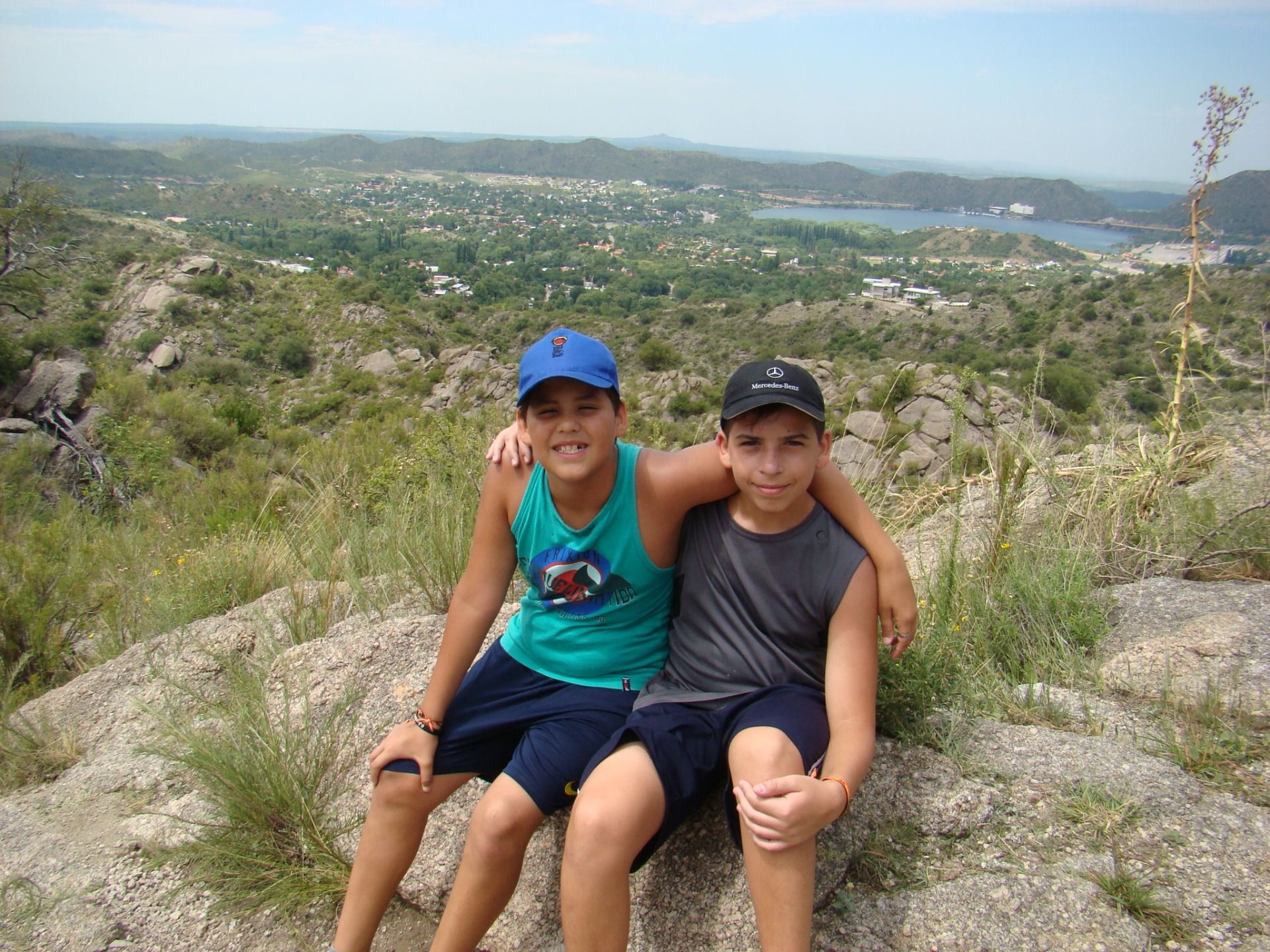 My son with his frien, view of the city an the lake