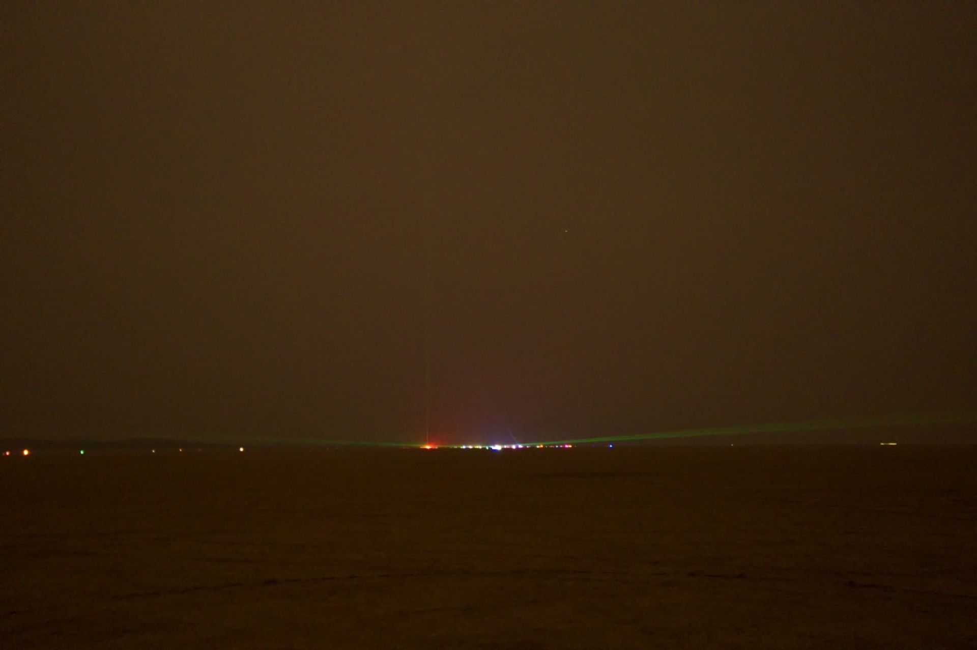 Sound Camp at 5 am. Just enough smoke and dust to make the lasers look really cool but super hard to photograph.