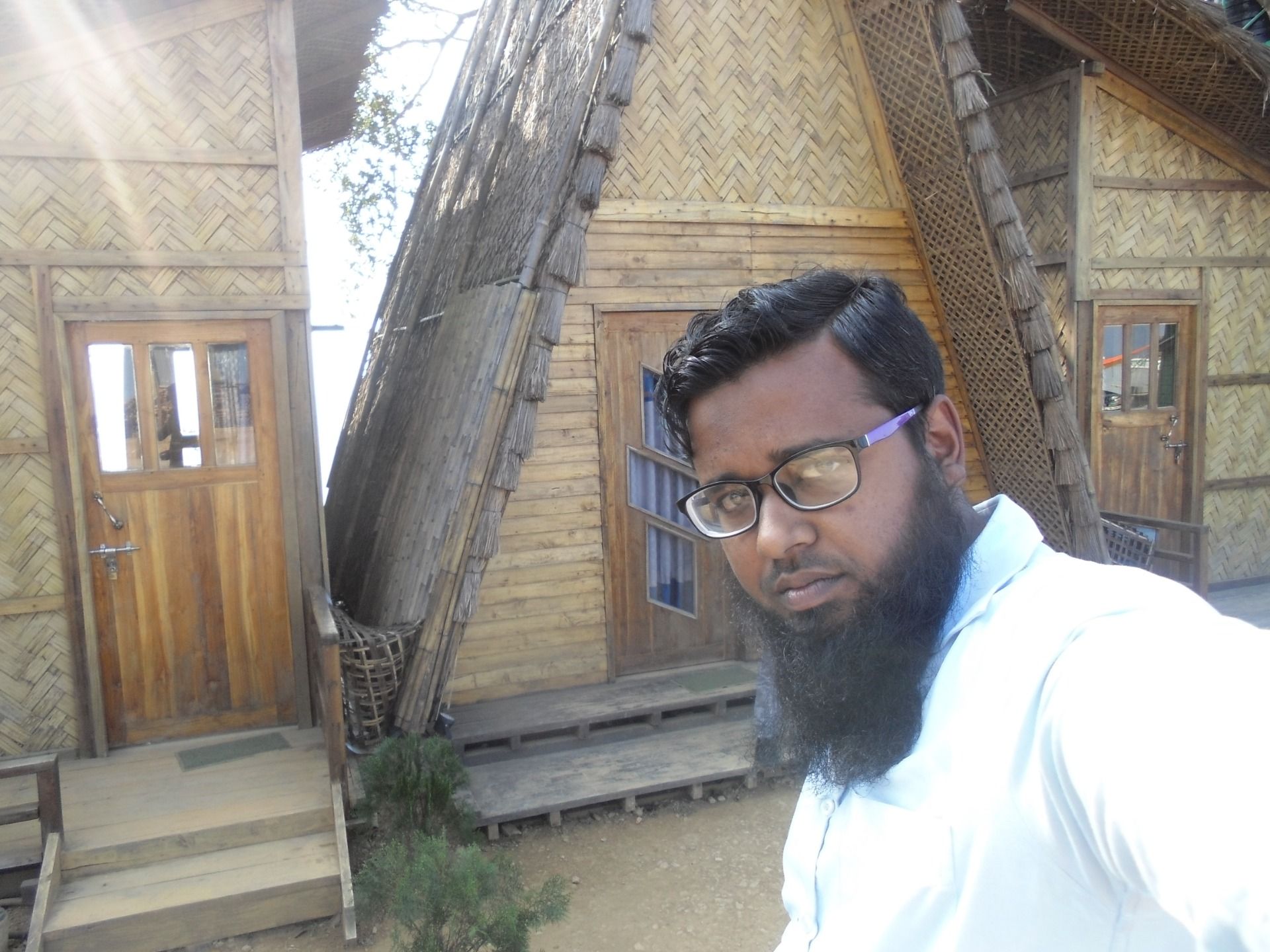 In front of a nice cottage