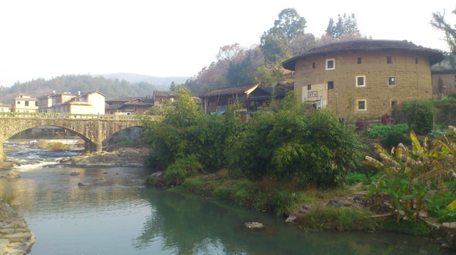 Visit the ancient Tulou village in YongDing
