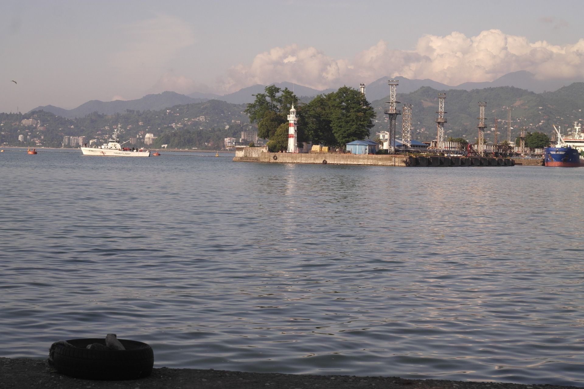 Light tower stands in the middle of the industrial and recreational parts.