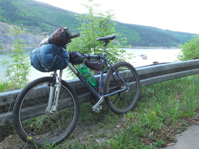 Updated version of my bikepacking logistics with sleeping bag attached to the handlebars
