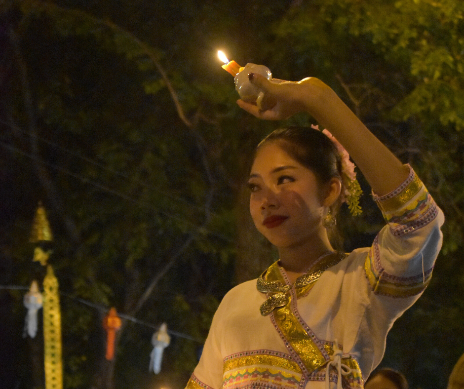 Thai lady during the parade with her lights 