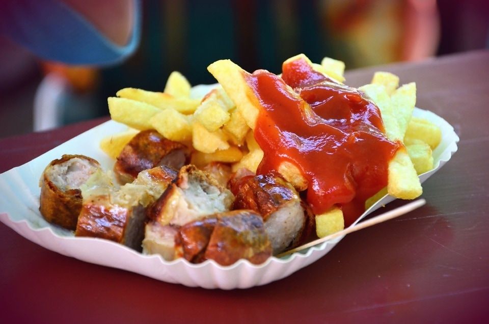 Currywurst,sausage served with curry ketchup and fries