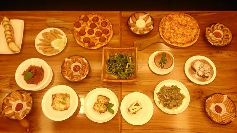 A table adorned with a variety of delectable Italian dishes, ready to indulge.