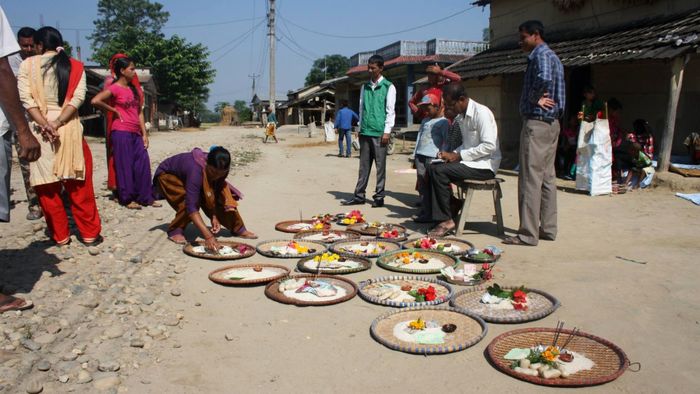 People’s gifts to the local school: rice, some local bread, money and incense [1/3]