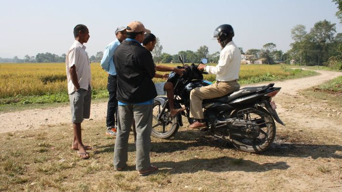 Our host Tara (on the bike) and his friends [2/3]