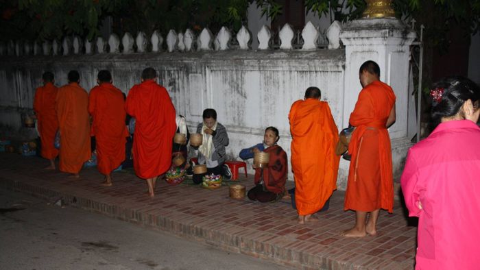 Almsgiving ceremony in Luang Prabang