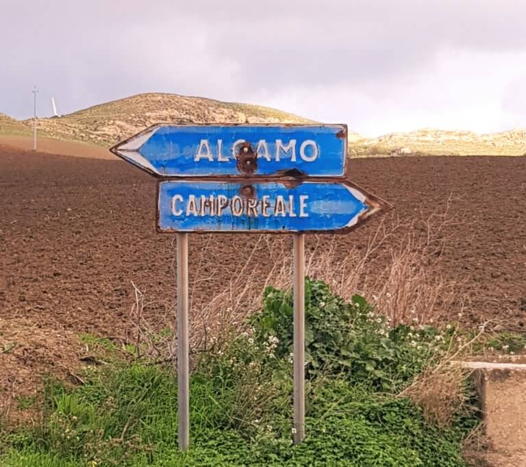 Probably ordinary vandalism. On the road towards Corleone, it inevitably suggested something less reassuring.