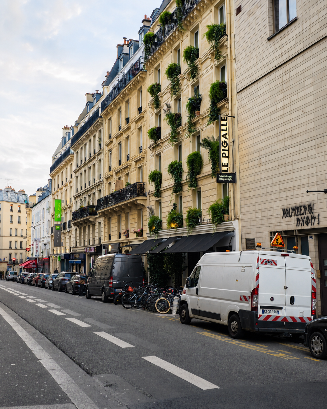 Le Pigalle’s plant-covered façade: plenty of personality, an excellent location and, as I was about to discover, considerably more space outside than inside.