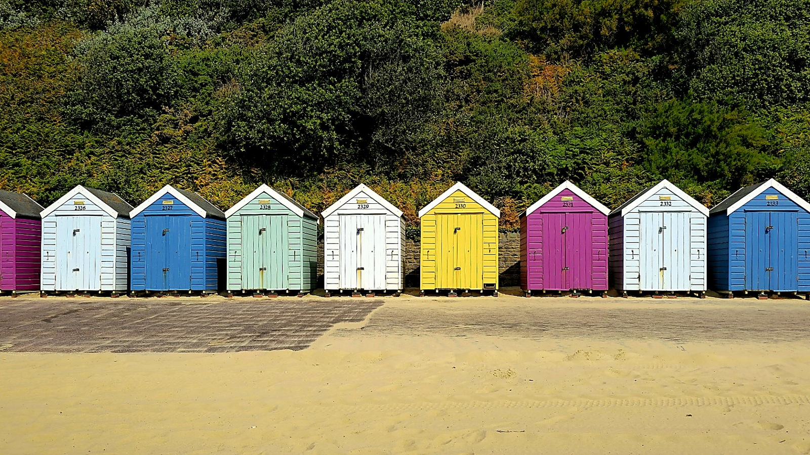 Bournemouth’s beach huts supplied the colour and order expected from a proper English seaside resort.