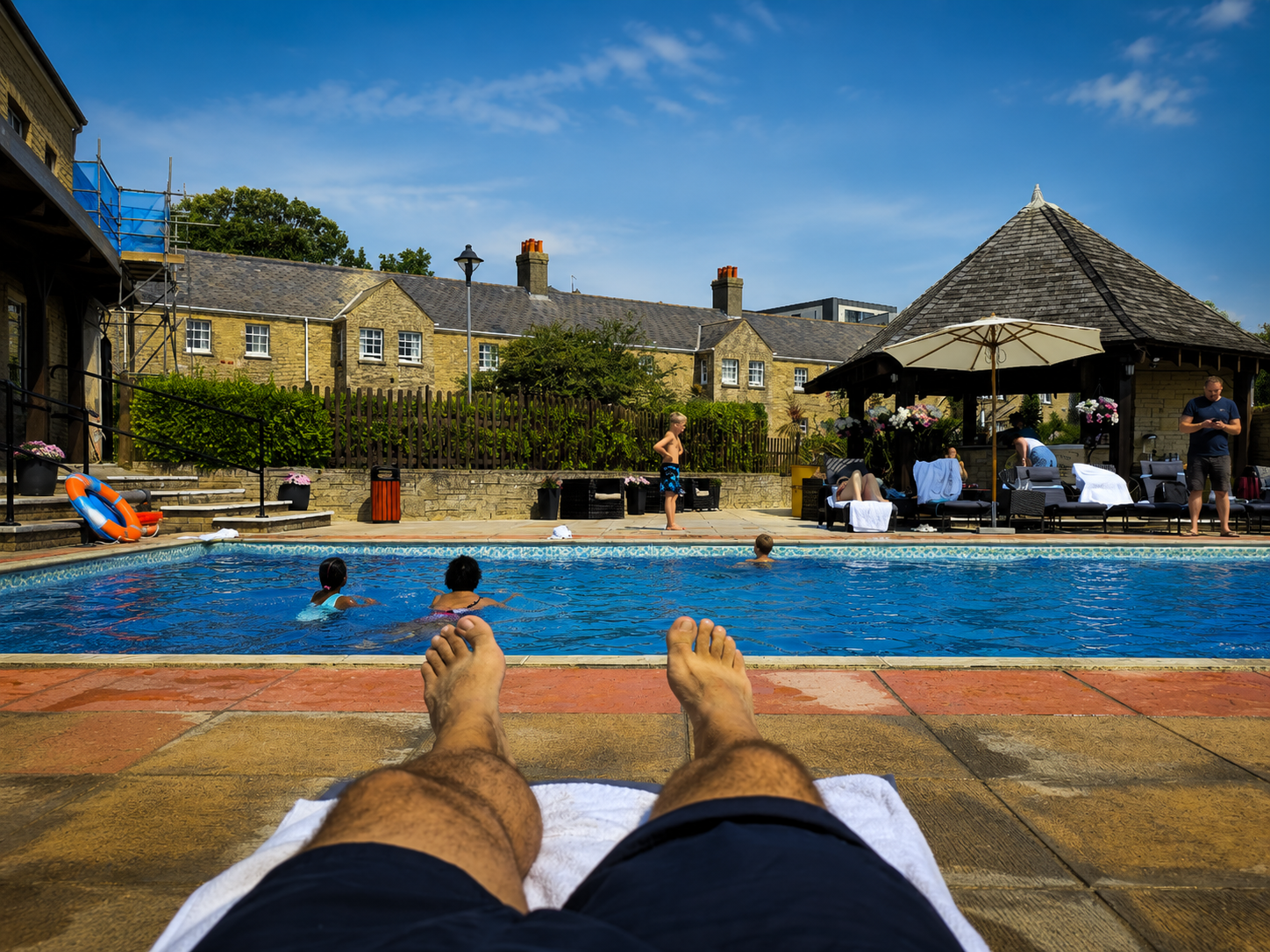 The outdoor pool was one of the hotel’s genuine strengths—an unexpectedly convincing place to spend a warm English afternoon.