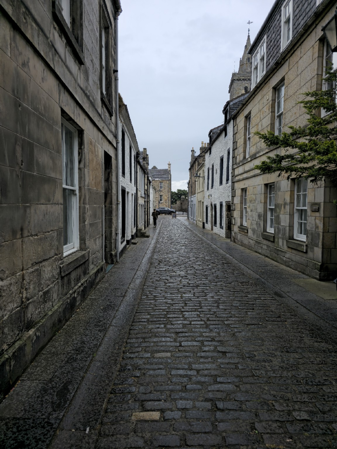 One of the narrow lanes threading through the university quarter, where even ordinary student life comes wrapped in centuries of stone.