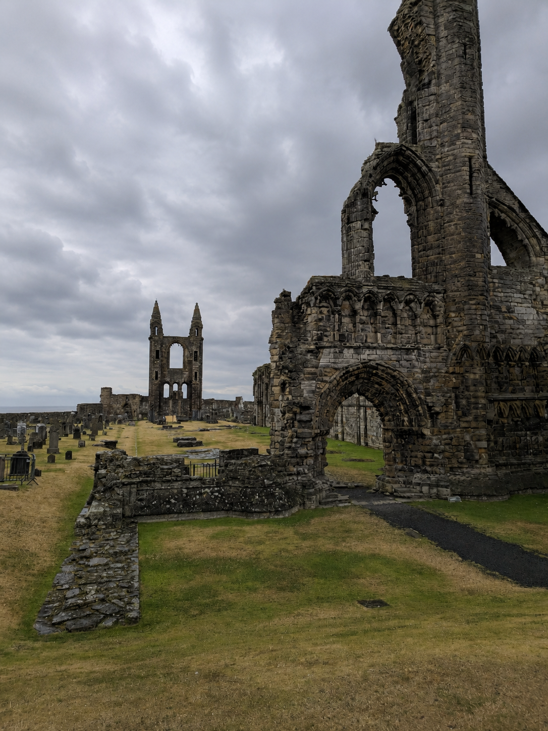St Andrews Cathedral in ruins, its surviving towers still commanding the town beneath a suitably Scottish sky.