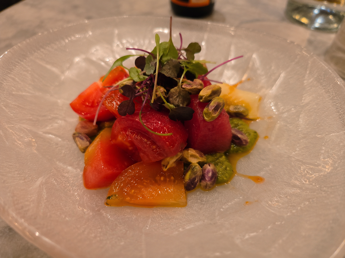 The Ivy’s heirloom tomato and watermelon salad—the dish that turned watermelon from an unlikely addition into the reason I remembered dinner.