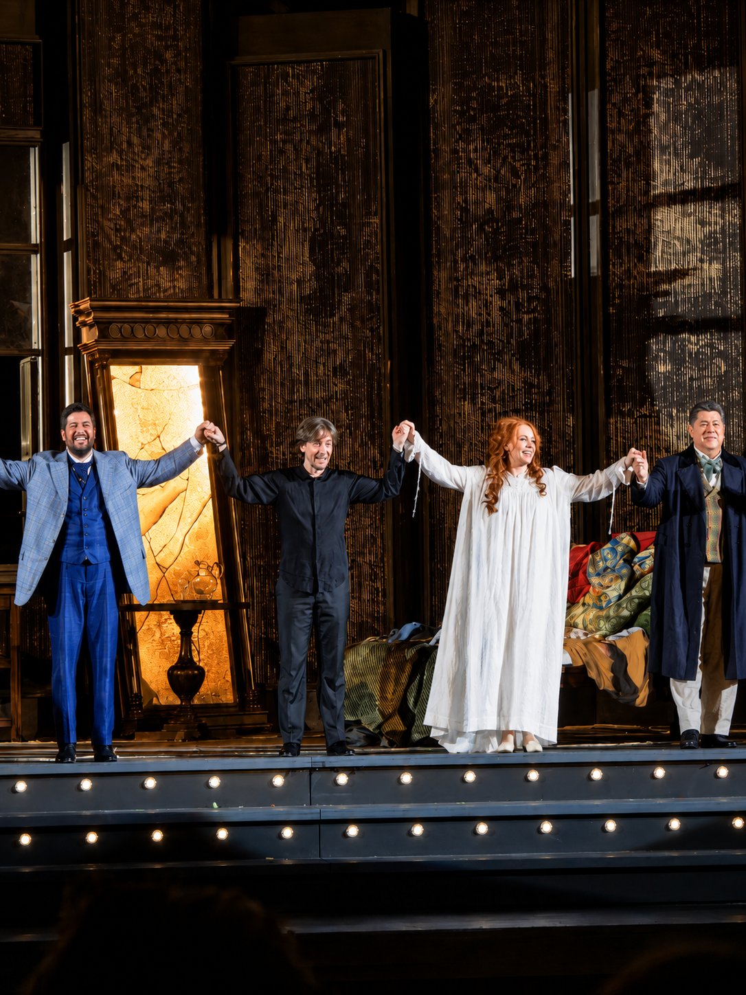 Antonio Poli, conductor Michele Spotti, Vasilisa Berzhanskaya and Luca Salsi at the final curtain call on 31 July 2026 — the Arena finally giving its dark, formidable Violetta the ovation she had earned.