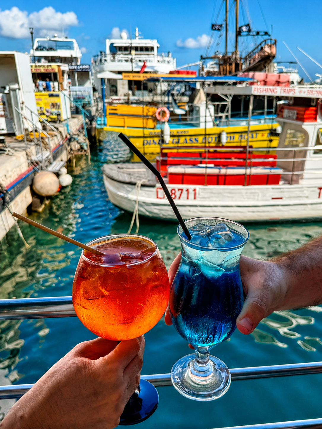 Cocktails at Pelican Restaurant, with Paphos Harbour providing a considerably more convincing backdrop than either drink required.