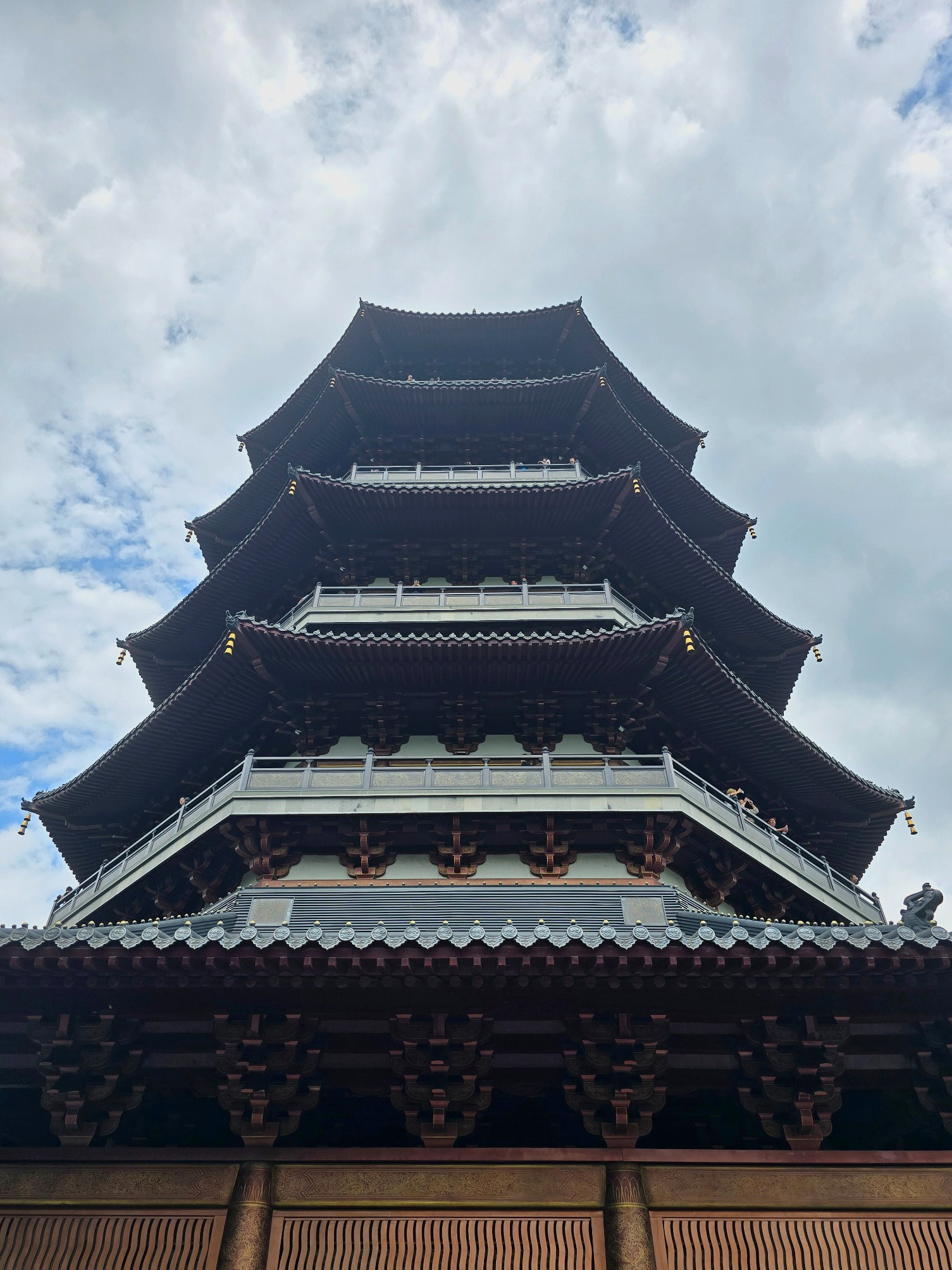 Leifeng Pagoda at close range — traditional in silhouette, unmistakably monumental in scale.