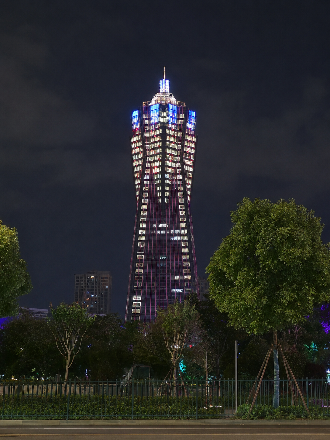 Zhejiang Global Center illuminated above West Lake Cultural Square — one of the defining landmarks of modern Hangzhou.