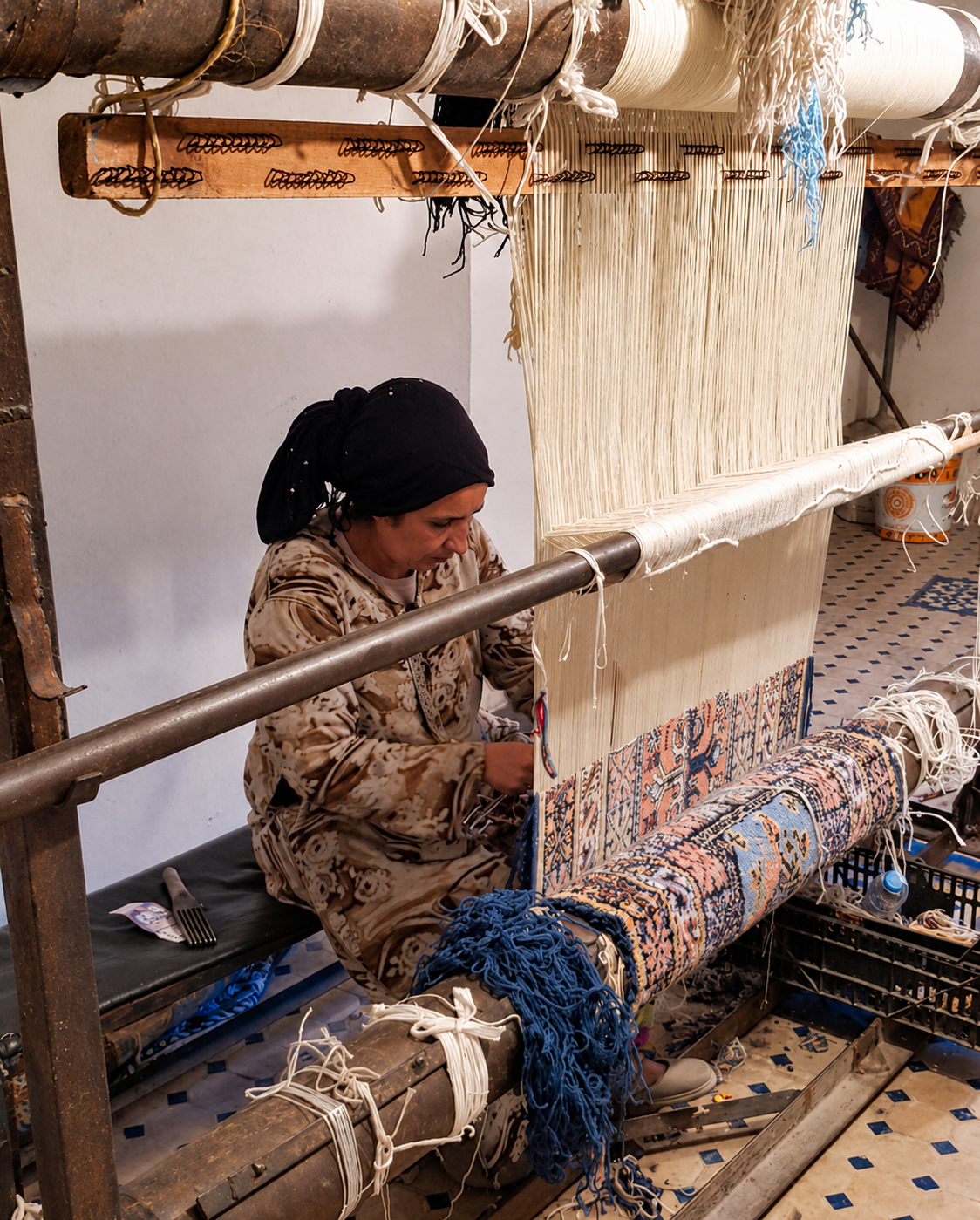 Traditional carpet weaving in Fes — one of the few sales demonstrations I was genuinely happy to stop and watch.
