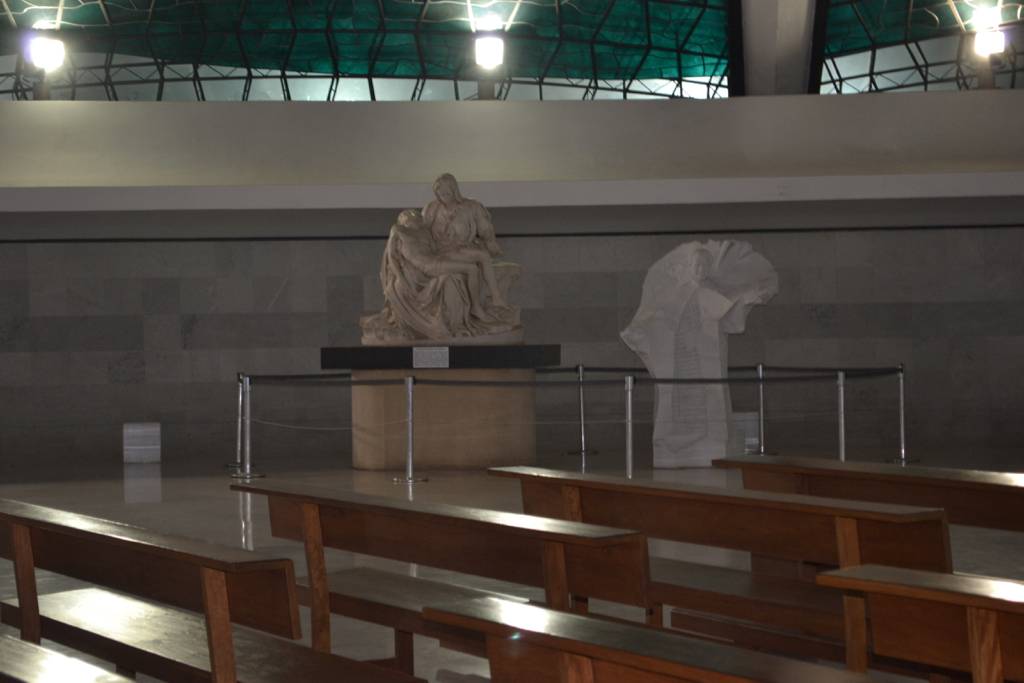 Replica of the Pieta by Michelangelo and statue of Pope John Paul II 