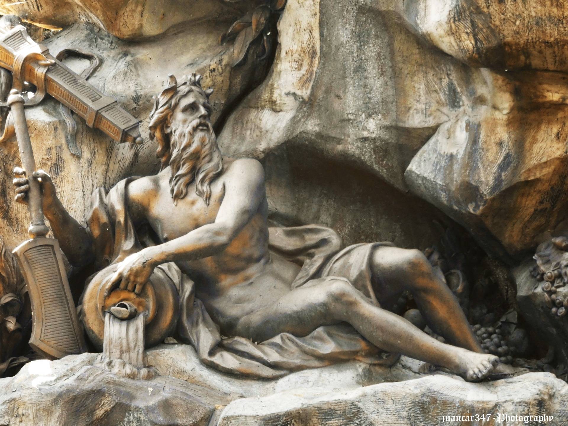 Sculpture of Neptune, pouring out the waters of life