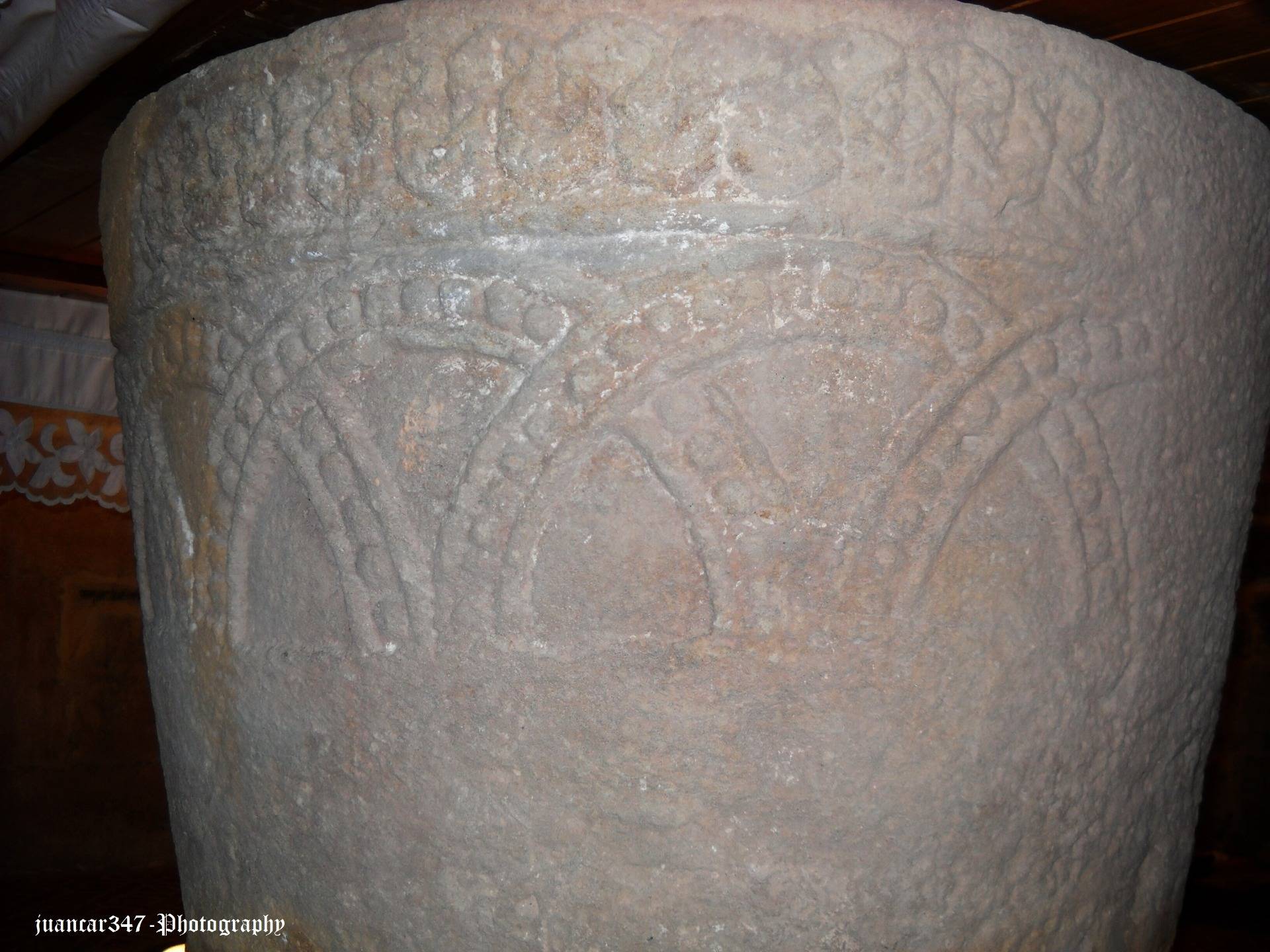 Romanesque baptismal font from the 12th century