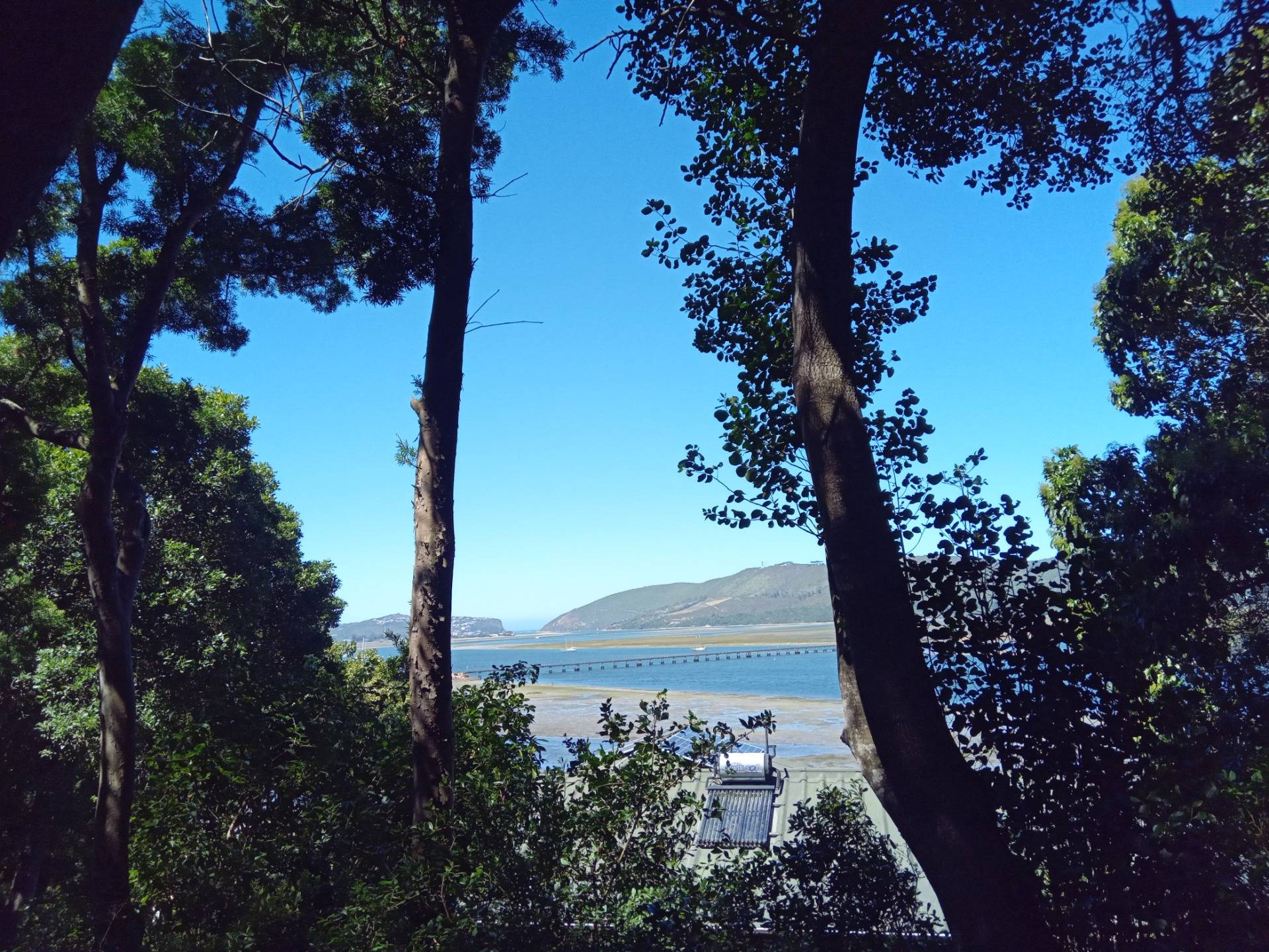 A glimpse of the Knysna lagoon through some of the indigenous trees in this lush first region, with the Heads just visible in the distance, leading out to the Indian Ocean. Sunny South Africa uses a lot of solar power to supplement the less than optimal national electricity grid