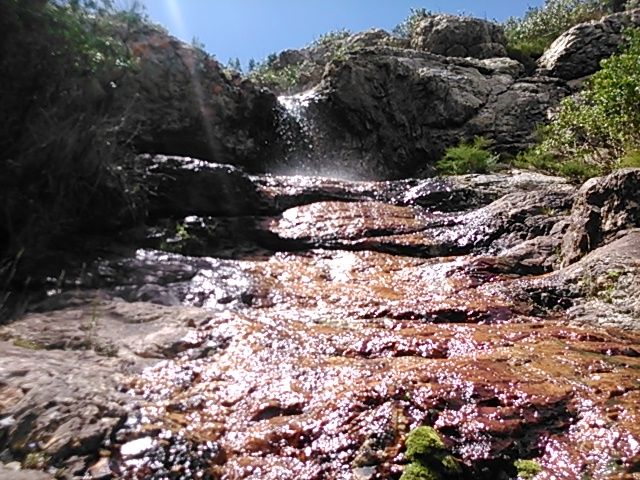 Hidden waterfall on the Plettenberg Bay coastal hiking trail, South Africa 