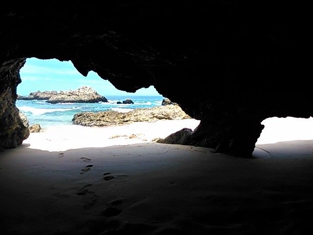 Epic shoreline caves outside the remote Plettenberg Bay holiday town on the south coast of Africa