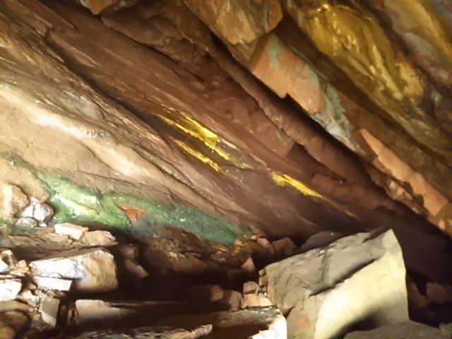 Notice the strange yellow substance which I guess might be from bats in the cave