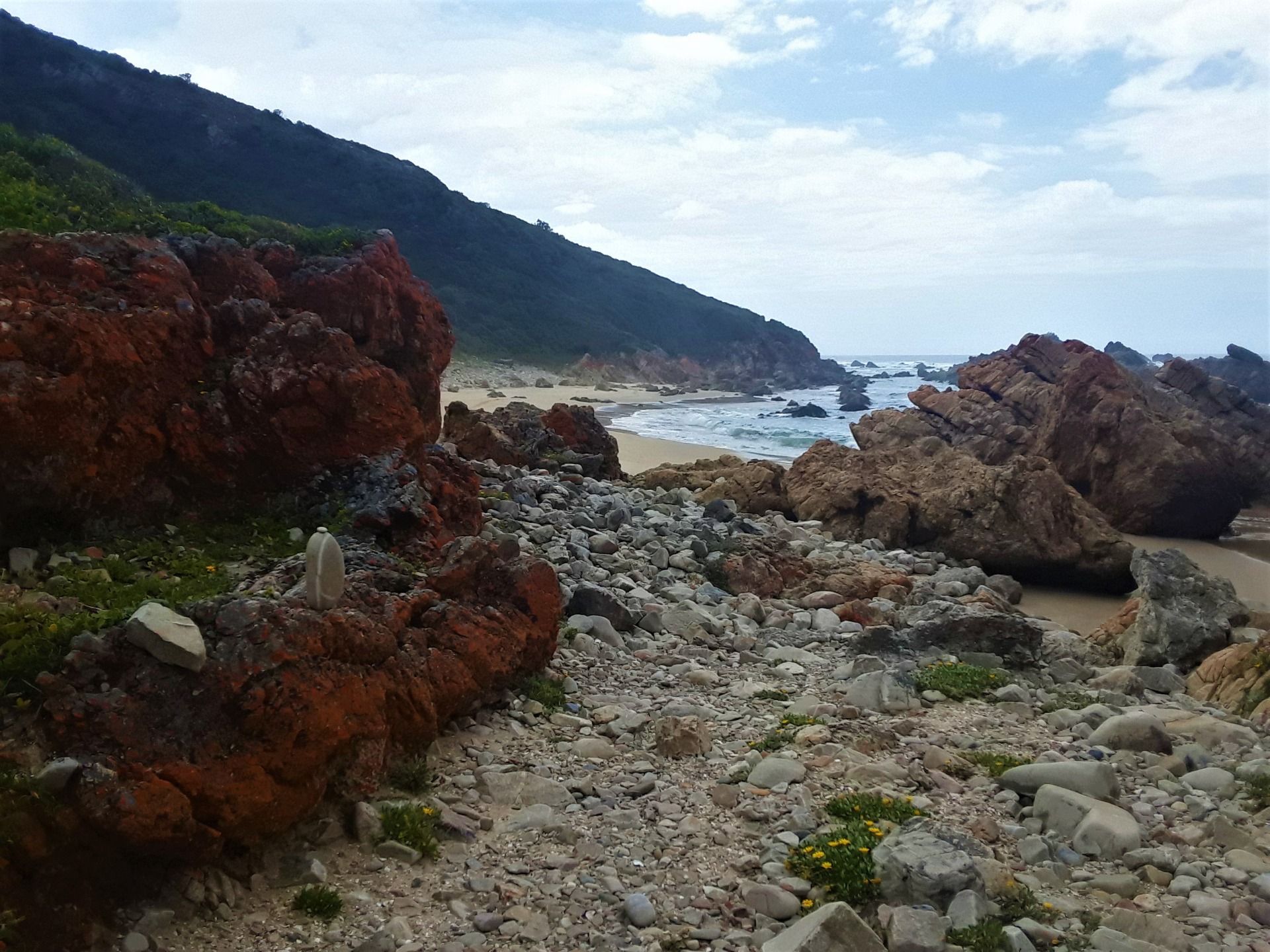 Past Arch Rock toward further lesser known beaches, facing east